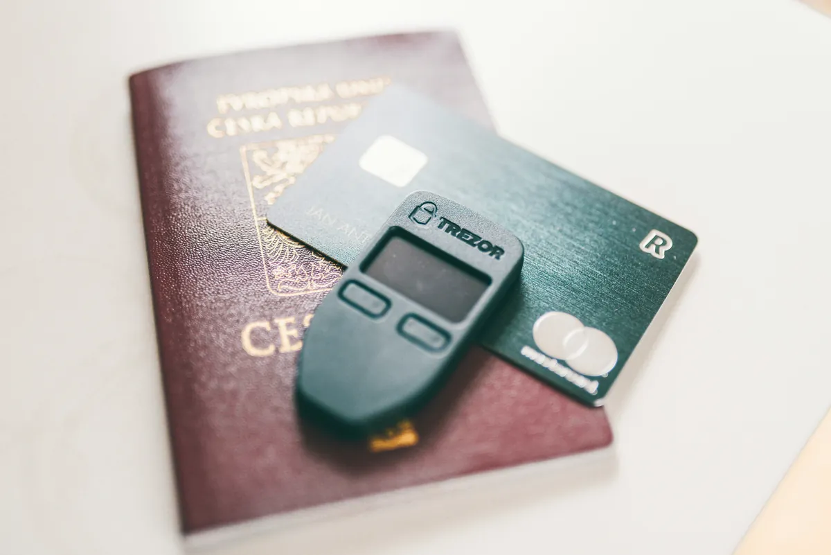 Trezor hardware wallet with passport and payment card